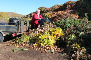 Resident Dropping Yard Debris at Resource Renew Yard Waste Compost Site